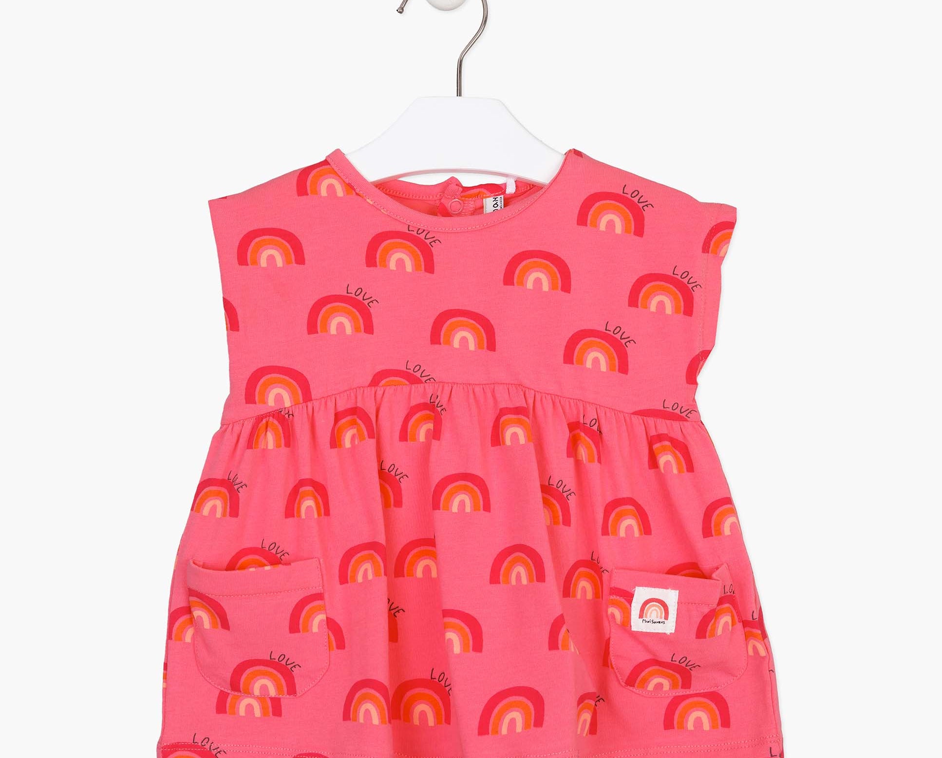 Losan pink sleeveless rainbow dress for baby girls with a round neckline, two pockets at the front and snap buttons for easy closure at the back