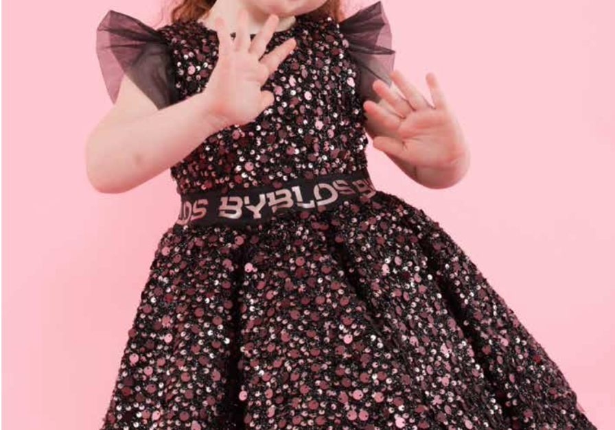Byblos girl dress black sequins structured gown, pink beeds, and tulle skirt for extra volume. 